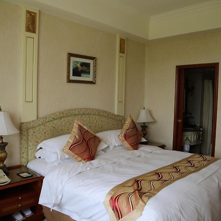 Huiquan Dynasty Hotel Qingdao Oda fotoğraf