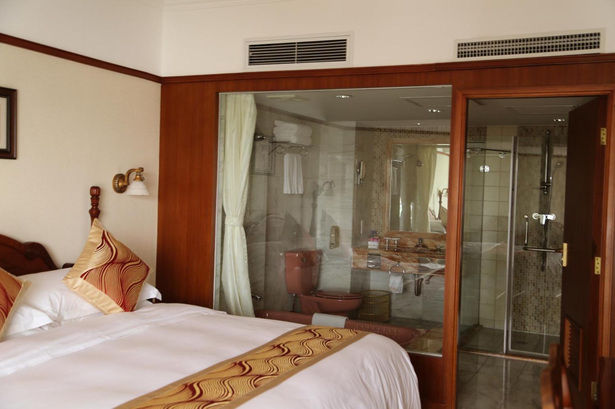 Huiquan Dynasty Hotel Qingdao Oda fotoğraf